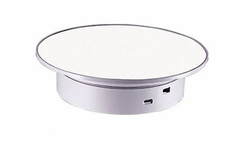 Rotating display white mirror top other