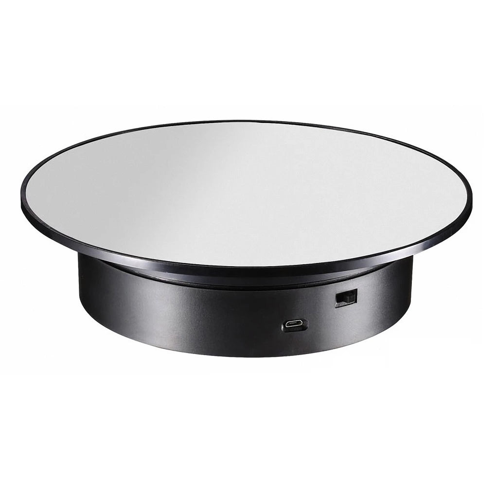 Rotating display black mirror top other