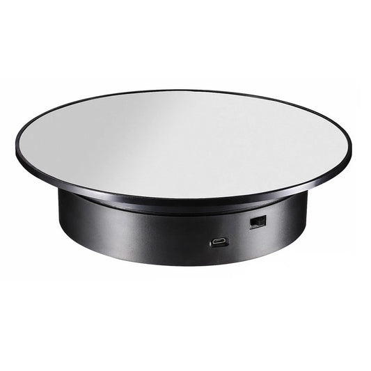 Rotating display black mirror top other